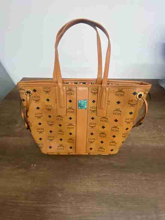 MCM Handbags - ✨ MCM Cognac Monogram Reversible Medium Shoulder Tote Bag